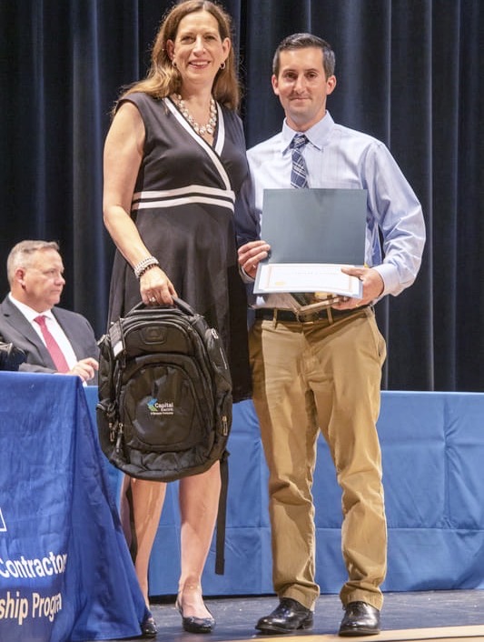 Stephen Fusting receiving his diploma at the Harford County Electrical Contractors Association apprenticeship graduation in 2023
